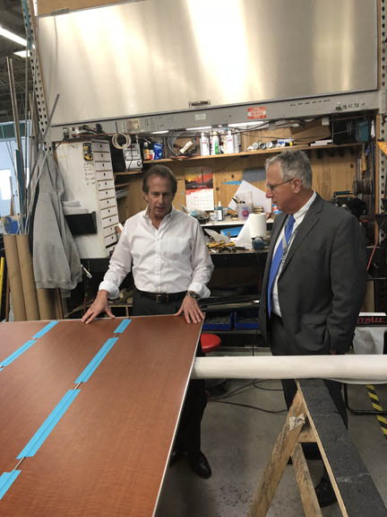 Mayor of Lynn inspecting the building of elevator cab